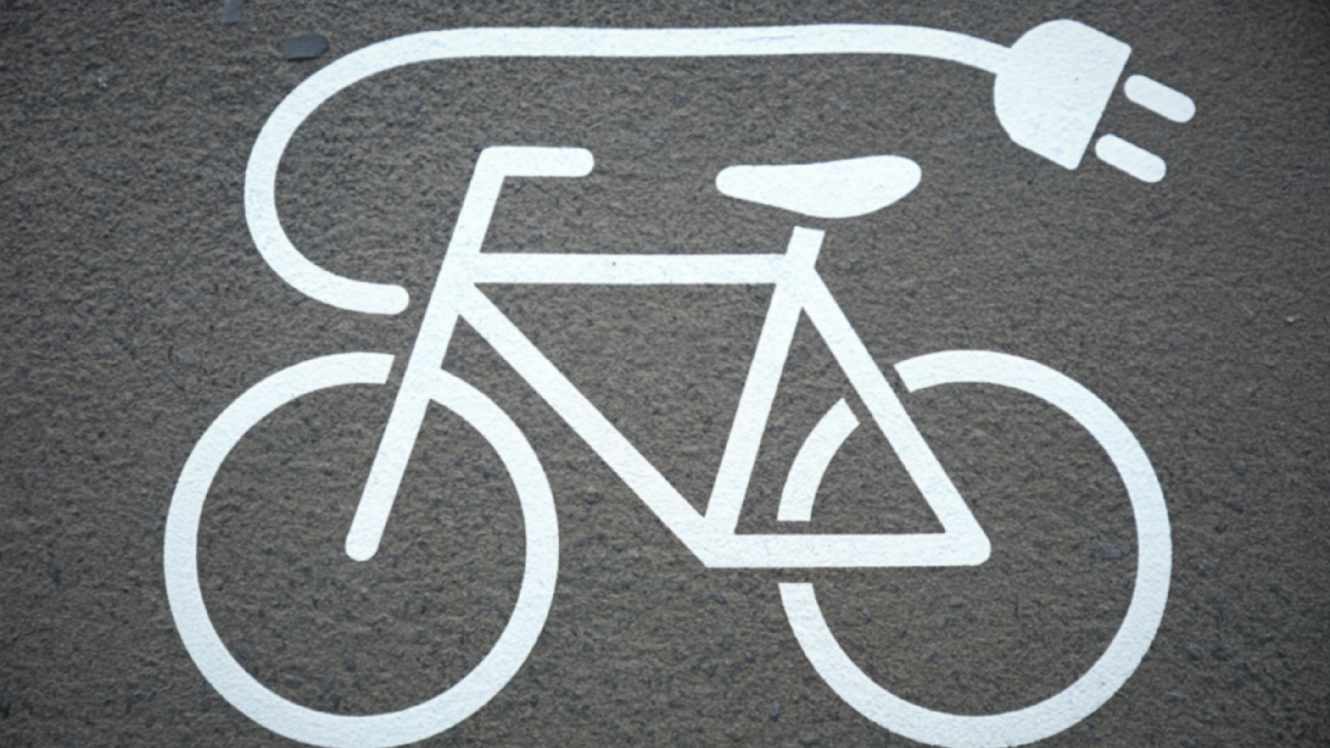 Illustrering av en elcykels laddning